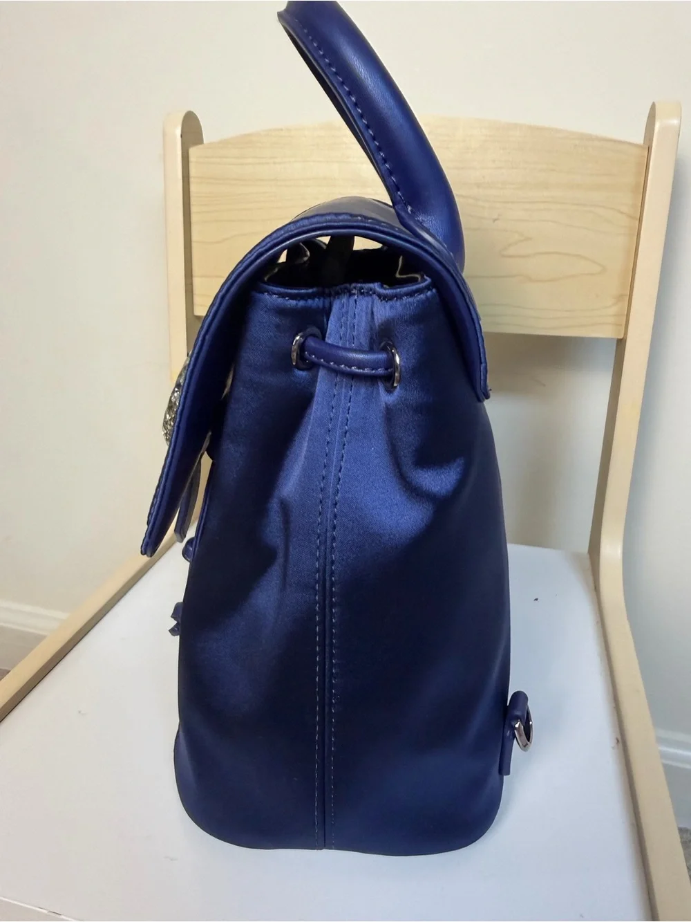 Charles & Keith Sapphire Satin Mini Backpack with Crystal Buckle